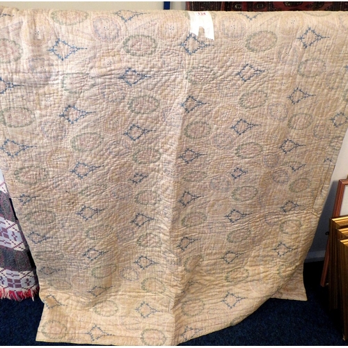 134 - A Welsh wool blanket together with a worn faded Paisley ?  quilt and a further rug (3)