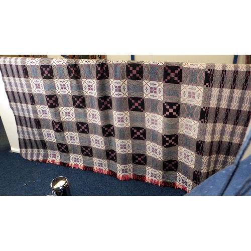 134 - A Welsh wool blanket together with a worn faded Paisley ?  quilt and a further rug (3)