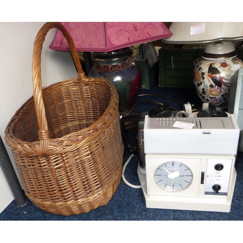 141 - A Jones electric sewing machine together with two lamps, teasmaid and a wicker basket