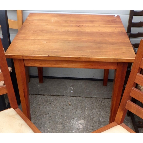 714 - A small modern oak kitchen table together with ten chairs, six & two pairs