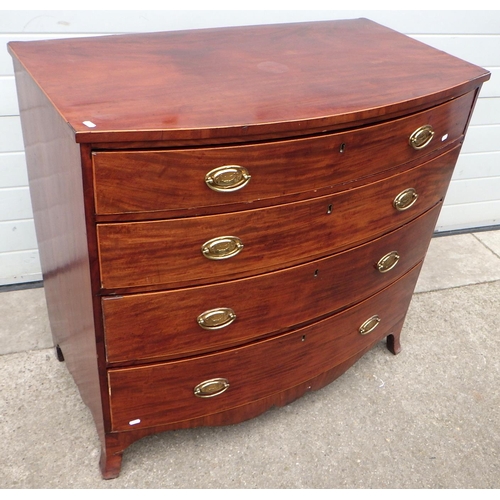 719 - A bowfronted mahogany chest of drawers, 105cm wide