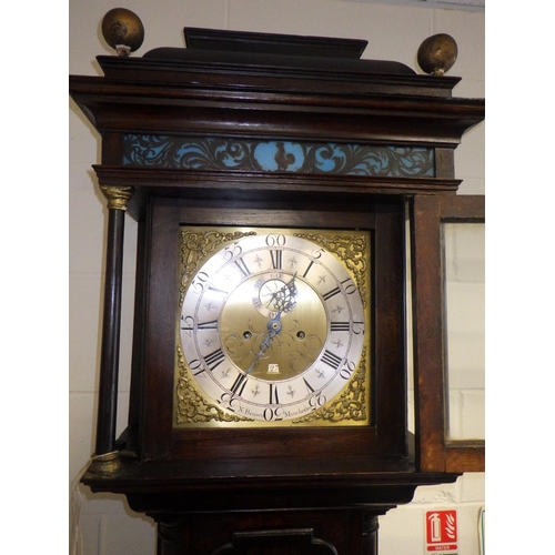 723 - An oak longcase, 8 day clock with brass face and silvered chapter ring, N. Brown, Manchefter