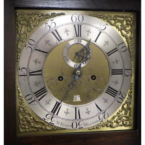 723 - An oak longcase, 8 day clock with brass face and silvered chapter ring, N. Brown, Manchefter