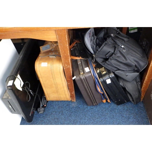 181 - A quantity of cases and briefcases together with a TV/DVD player with remote