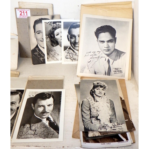 211 - A qty of facsimile signed vintage film star cards together with a small qty of books