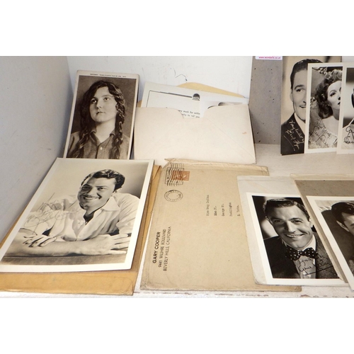 211 - A qty of facsimile signed vintage film star cards together with a small qty of books