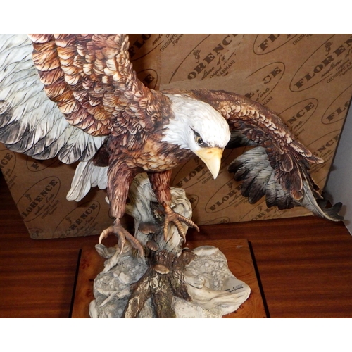 214 - A large Florence eagle, foot af, with box