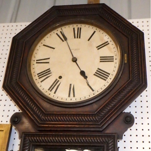 224 - A large American drop dial wall clock 85cm tall