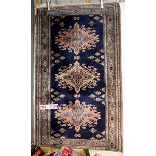 232 - A blue ground Turkish rug 95 x 160cm