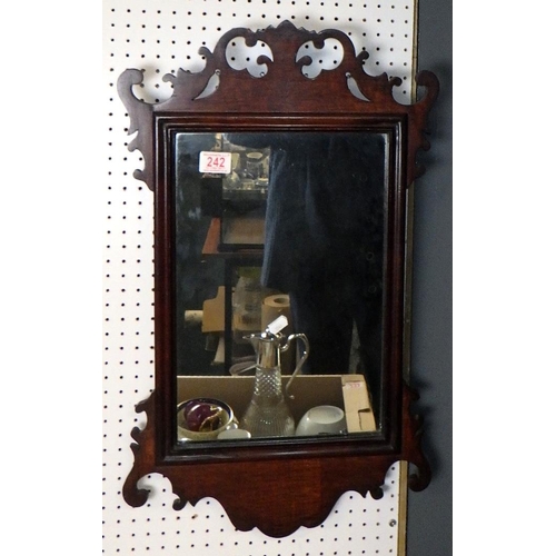 242 - Two mahogany fretwork mirrors