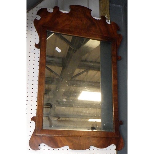 242 - Two mahogany fretwork mirrors