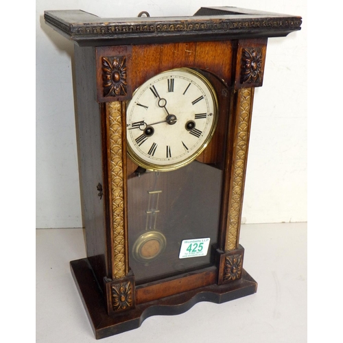 274 - A musical chiming 8 day clock 34cm tall