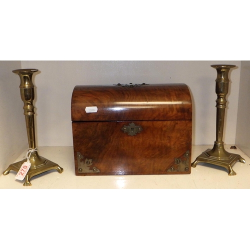 270 - A Victorian dome top tea caddy together with a pair of brass candlesticks (3)