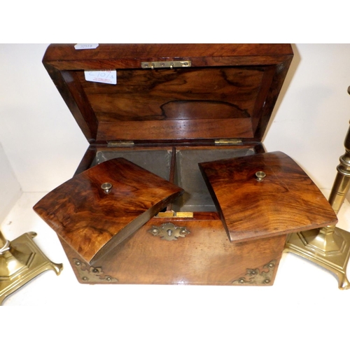 270 - A Victorian dome top tea caddy together with a pair of brass candlesticks (3)