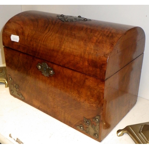 270 - A Victorian dome top tea caddy together with a pair of brass candlesticks (3)