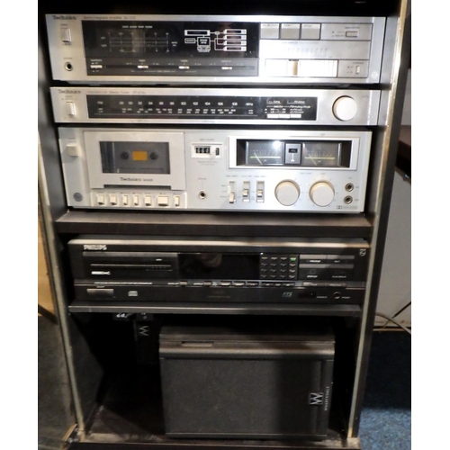 281 - A Technics Hi-Fi system to inc Wharfedale speakers and a Phillips disc player
All electricals sold a... 