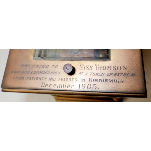 288 - A late Victorian brass cased repeating carriage clock and case, Presented to Miss Thomson 1905