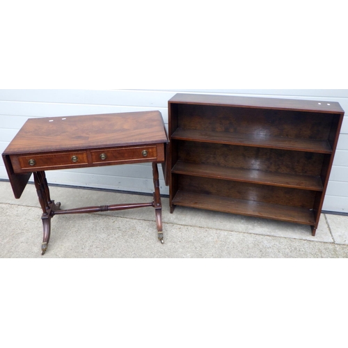 609 - A reproduction mahogany sofa table together with a low open bookcase (2)