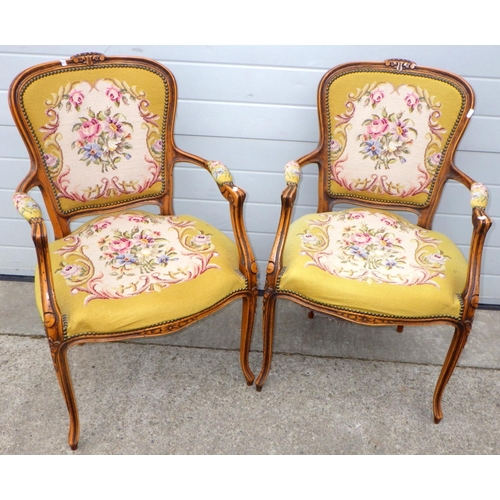 612 - A pair of embroidered Louis XV style open armchairs, upholstery a/f