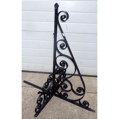 615 - A wrought iron bracket for a hanging sign