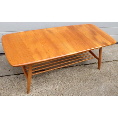 626 - A blonde Ercol coffee table, 105cm long