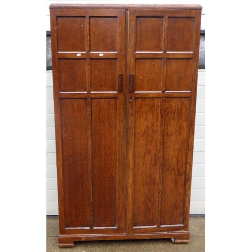 632 - A panelled oak/ply wardrobe, 105cm wide