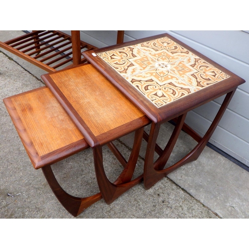 633 - A tiled G.Plan nest of three occasional tables together with a teak folding card table (2)