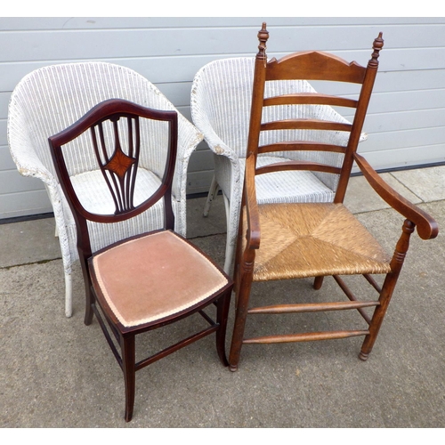 647 - A ladderback open armchair, two Lloyd Loom tub chairs and an Edwardian bedroom chair (4)