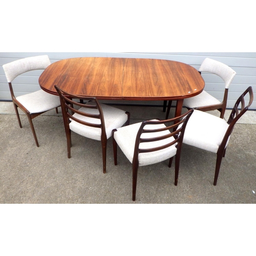 A dining table together with three ladderback chairs and a pair of chairs (6)