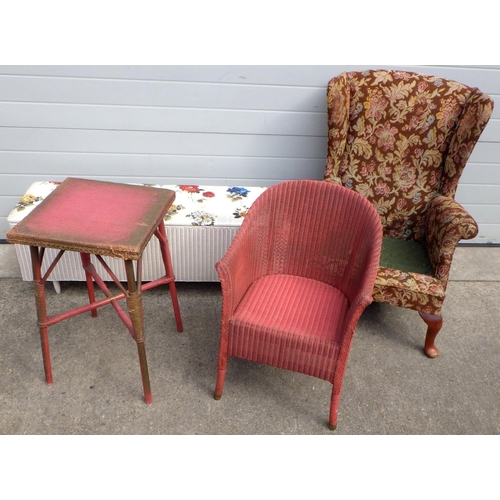 661 - A Lloyd Loom tub chair, ottoman, occasional table and a Parker Knoll armchair frame (4)
