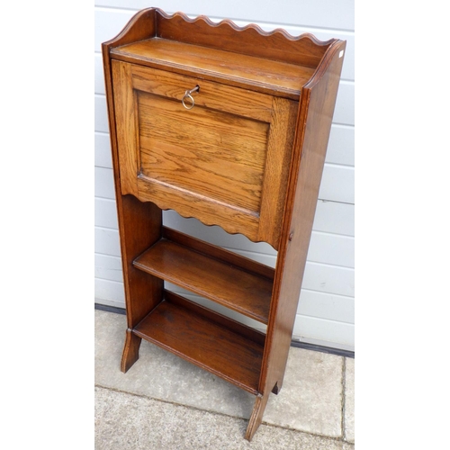 664 - An Edwardian oak hall bureau, 53cm wide