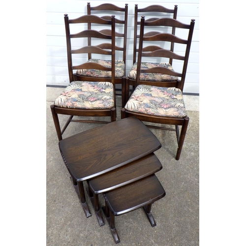 667 - A set of four dark Ercol dining chairs together with a nest of three occasional tables (5)
