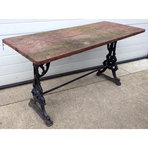 684 - A heavy cast iron based table 146 x 60cm