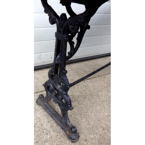 684 - A heavy cast iron based table 146 x 60cm