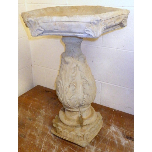 687 - A concrete bird table with hexagonal top, approx 61cm tall