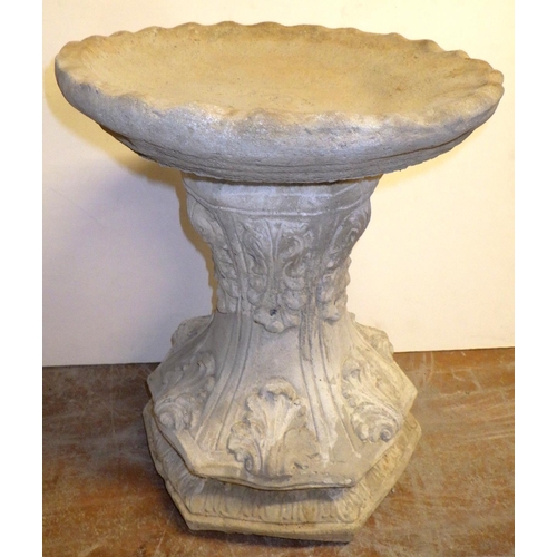 689 - A concrete bird bath, approx 40 cm tall