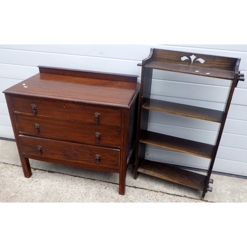 697 - A 1930's oak chest of drawers together with a narrow open bookcase (2)