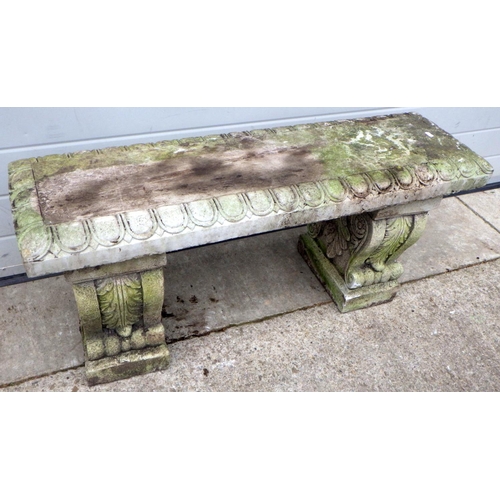 733 - A straight concrete garden bench, 108cm long