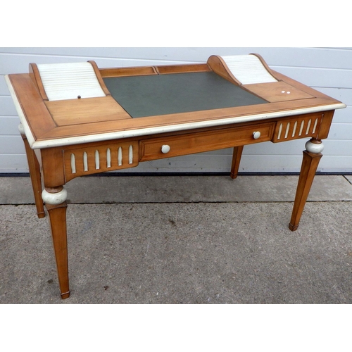 744 - A writing desk with painted moulding, 140cm wide