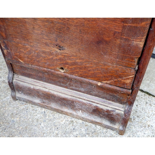 749 - A 1930's oak three drawer filing cabinet together with a pub table (a/f)