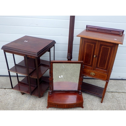 754 - An Edwardian toilet mirror, cabinet, revolving bookcase and a lamp standard (4)