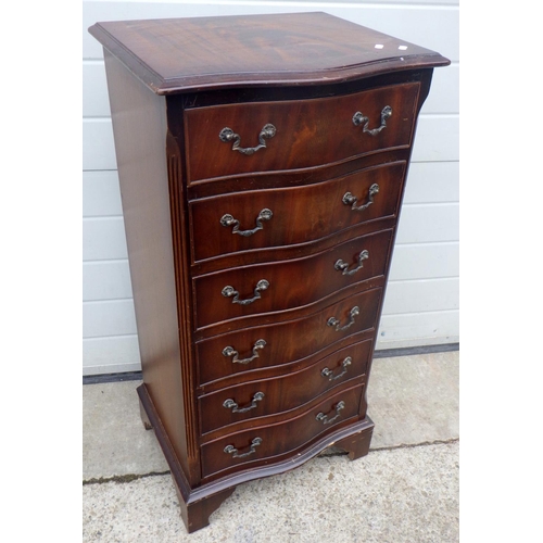 768 - A narrow reproduction mahogany bowfronted chest of drawers, 50cm wide