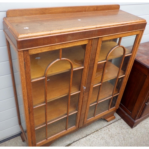 775 - A 1930's oak China cabinet together with late Victorian walnut dressing chest (2)