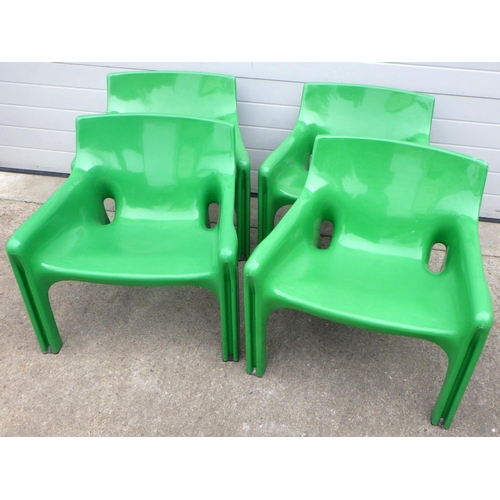 Four Vicario Armchairs in Green by Vico Magistretti for Artemide | Italian Space Age | 1970s, scuff marks, missing six of the black internal feet caps,  ex Leeds Central Library