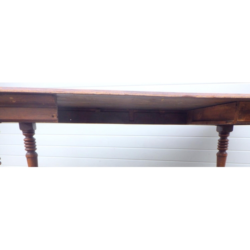 781 - A Victorian oak table on turned legs, missing central drawer, legs repaired (a/f) 190cm x 90cm, ex L... 