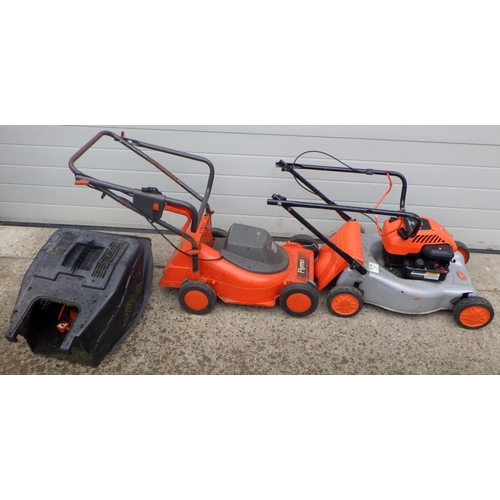 782 - A Flymo petrol lawnmower, together with a Flymo electric lawnmower, both on wheels
