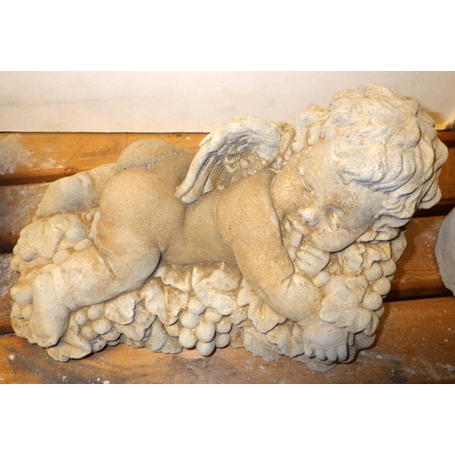 784 - A concrete figure of a cherub, a cherubs face wall pocket, a sleeping cherub and a lady's face (4)