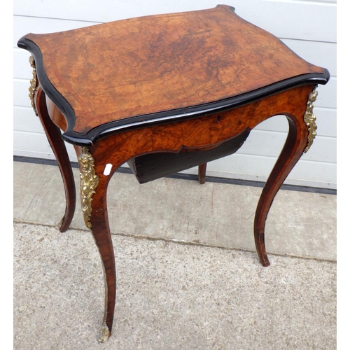 717 - A Victorian burr walnut work table, patch in top, 62cm wide