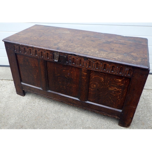 789 - A three panel oak coffer, 17th cen with a later floor & restoration 122cm wide