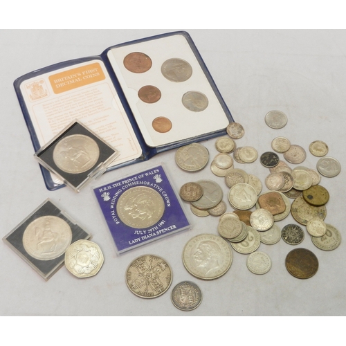 302 - Coins: a Victoria 1887 Double Florin, a George V 1935 Full Crown, George VI Malaya issues, etc.